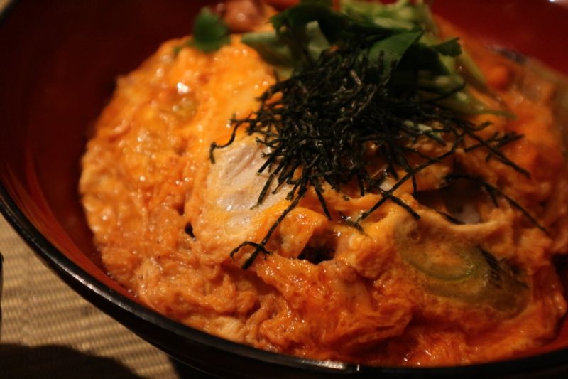 Oyakodon with chicken grilled over coal. Unusual apparently. photo