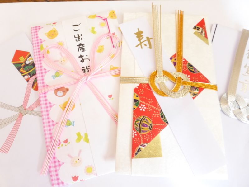 Envelopes and Notes:  Handing Over Hard Cash at a Japanese Ceremony photo