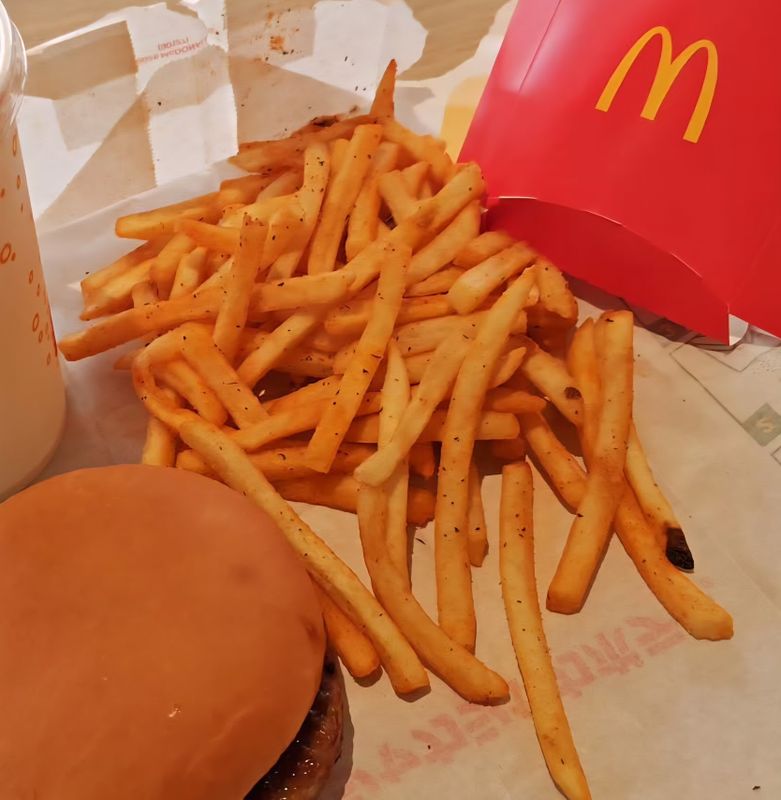 Calbee's pizza potato chips in French fry form photo
