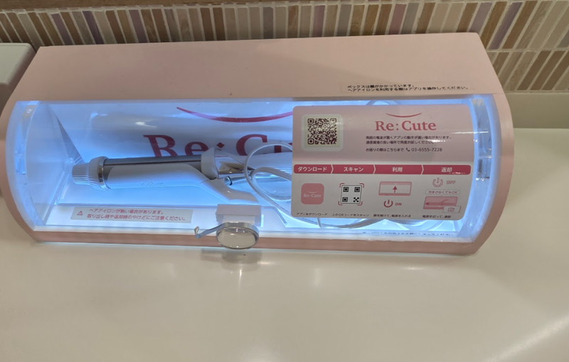 Hair Straightener in a Public Bathroom photo