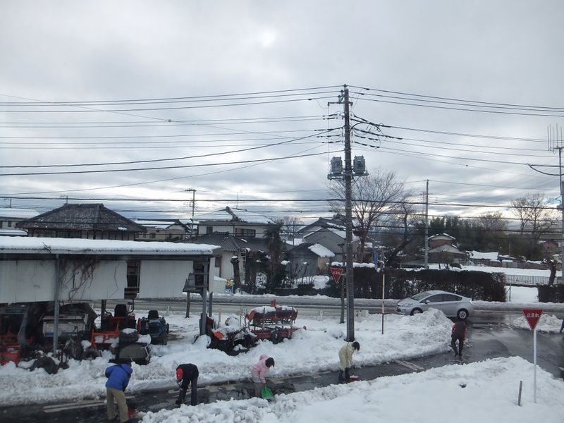 Only in Japan: community shoveling of snow? photo
