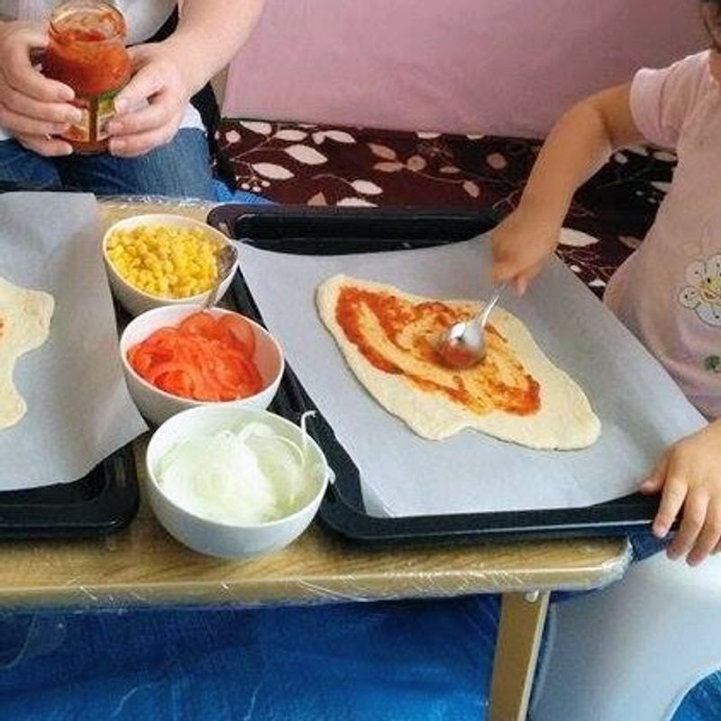 Homemade pizza for quasi-cooking with kids photo