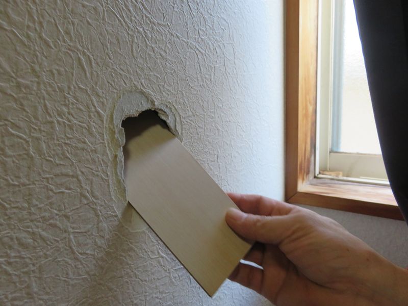 How to repair a hole in the wall photo