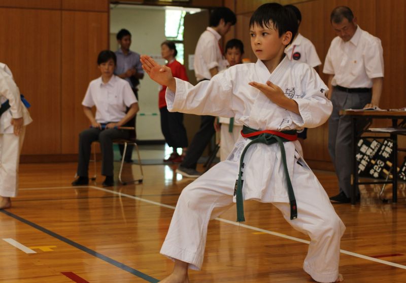 The role of a Karate Mom volunteering at a Karate tournament photo