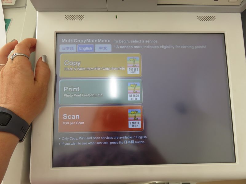 Comparing 7 11 and Family mart print machines. photo