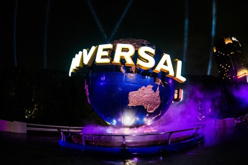 How much does it cost to travel from Tokyo to Universal Studios Japan? photo