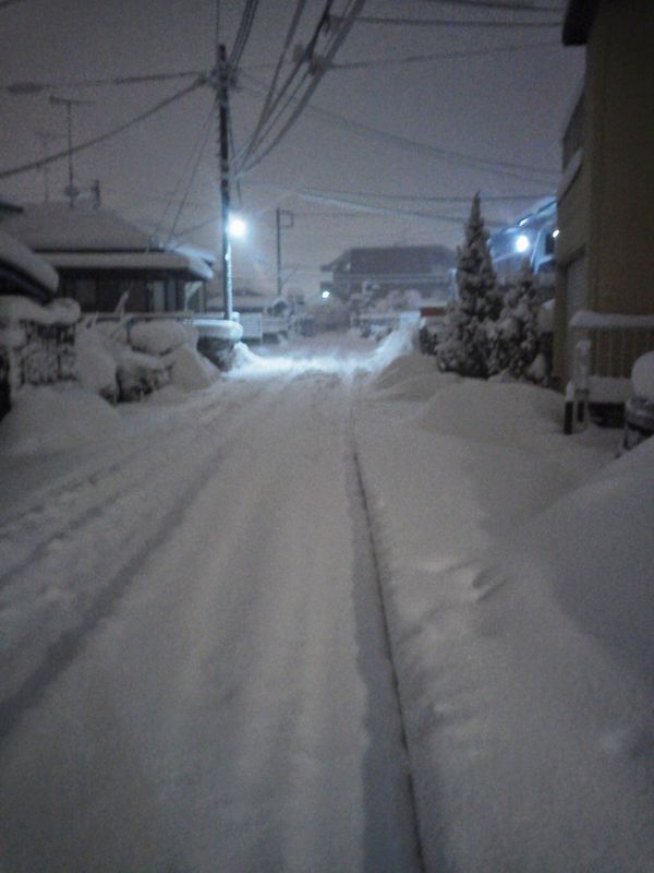 A couple of feet of snow do little to disrupt daily life in rural Japan photo