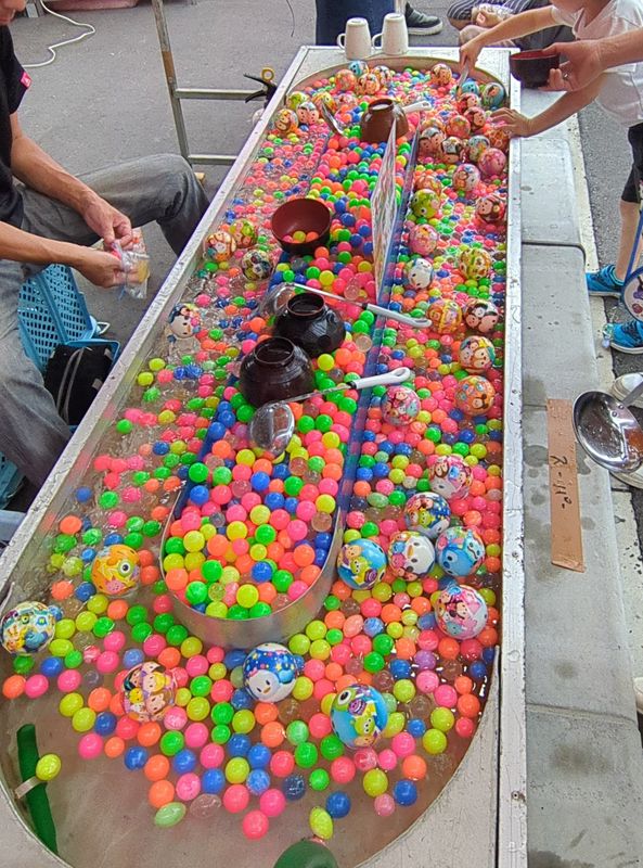 Super ball scooping at a Japanese festival photo