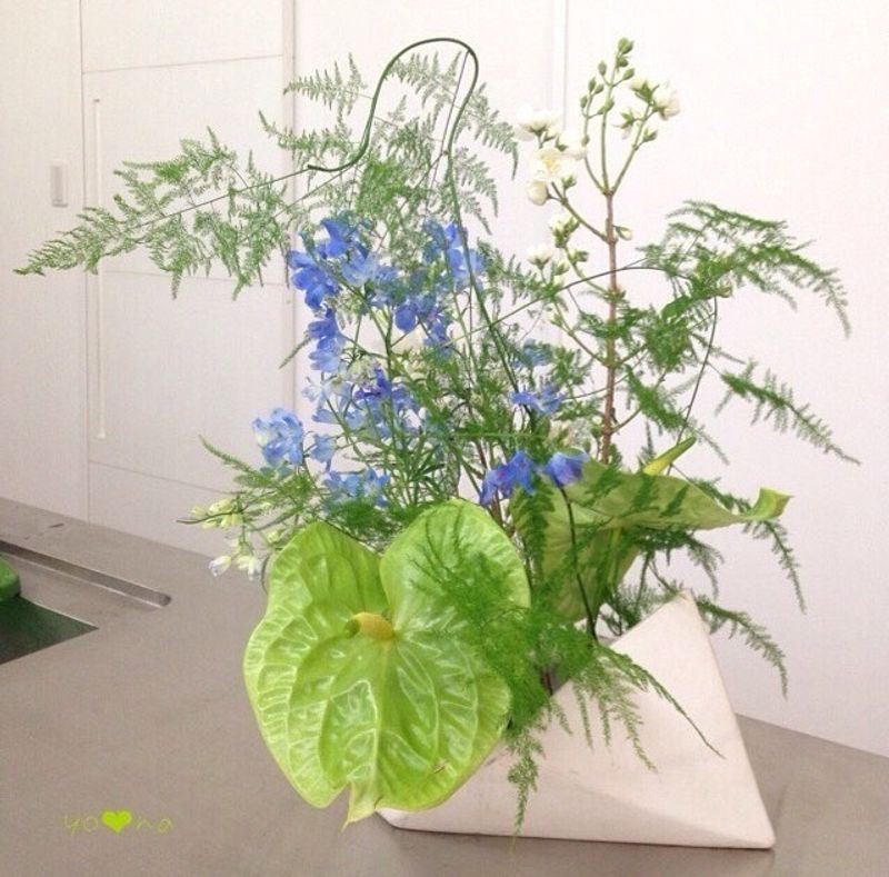 Ikebana means flower arrangement. True or false? photo